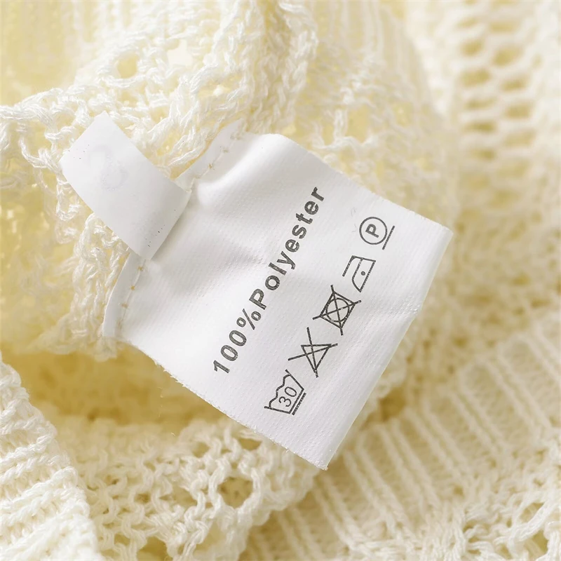 KEYANKETIAN letni nowy wiatr wakacyjny wielowarstwowy drążony żakardowy top z dzianiny damski O-Neck z krótkim rękawem cienki miękki wąski sweter