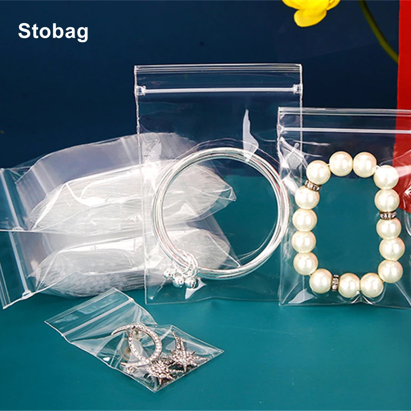 StoBag 100pcs Transparent Plastic Jewelry Packaging Ziplock Bags Sealed Small Waterproof Thickened Pouch Earrings Bracelets Logo