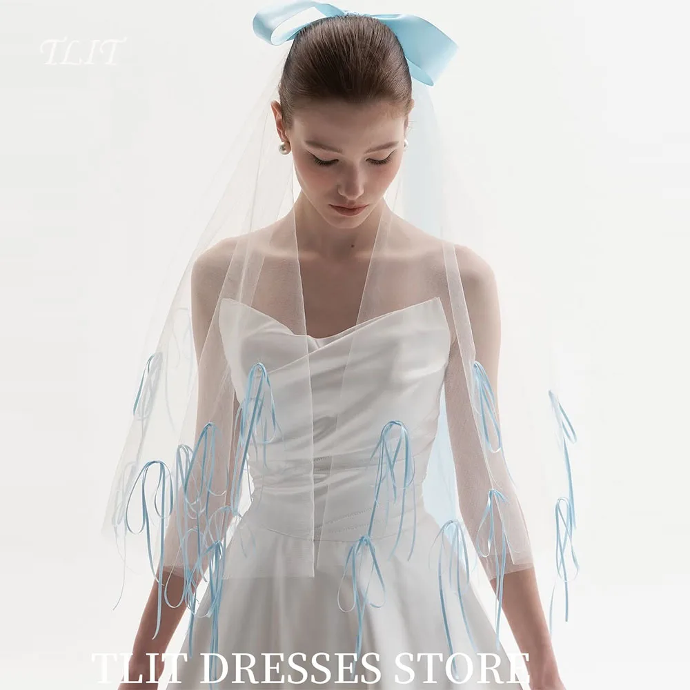 

TLIT Свежий небесно-голубой бант Свадебная фата невесты Короткая фата длиной до локтя Свадебная фата из тюля с большим синим бантом и вырезанным краем по индивидуальному заказу
