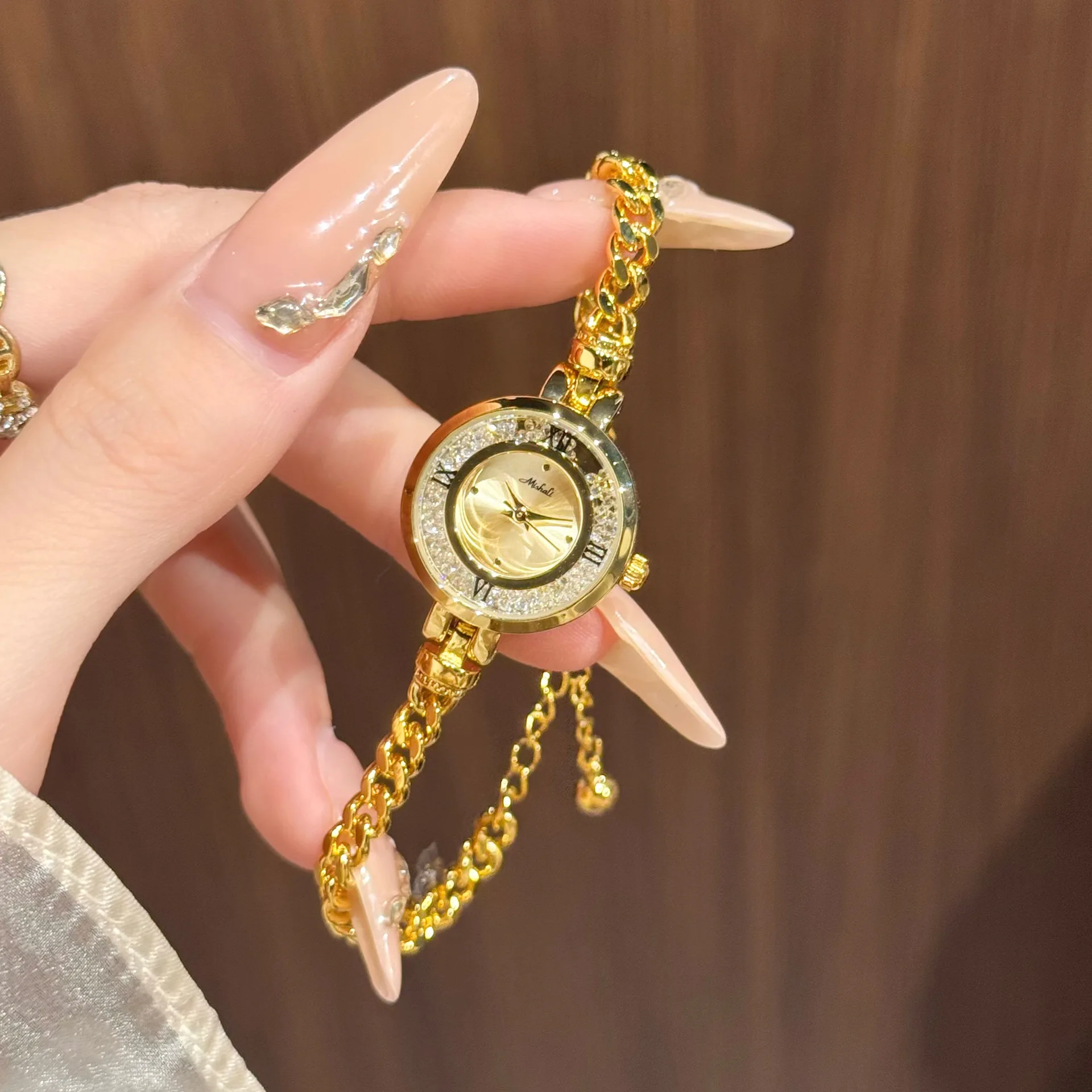 

Elegant women's wristwatch, stylish ball bearing dial women's bracelet watch, Roman quartz bracelet watch, a gift for women.