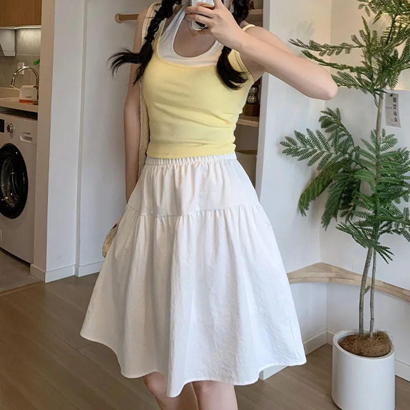 Falda corta holgada de estilo japonés para mujer, estilo universitario, cintura elástica con bolsillos, faldas para estudiantes, falda Lisa informal que combina con todo