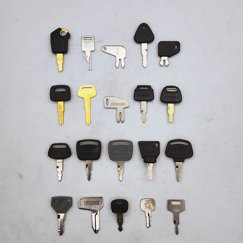 A set of 20 excavator keys, common construction machinery such as Caterpillar CAT, Komatsu, Sumitomo, Volvo, Bobcat, and Yanmar