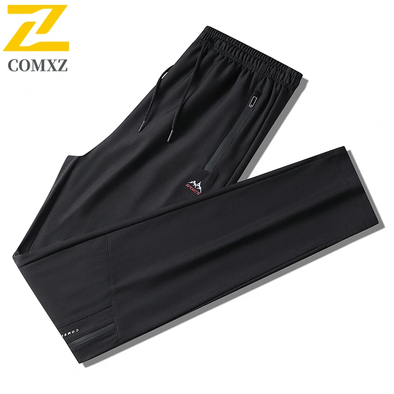 

COMXZ 2026 Jogging Pants Men Summer Thin Ice Silk Elastic Waist Drawstring Sports Pants Man Gym Casual Zipper Pocket Trousers