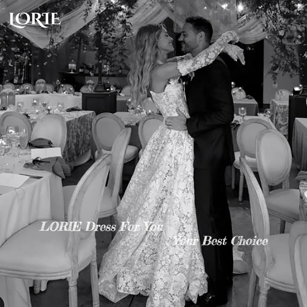 ローリーヴィンテージレース A ラインのウェディングドレス長袖ブラシトレイン A ラインアップリケブライダルガウン背中の開いた花嫁ドレスカスタマイズ