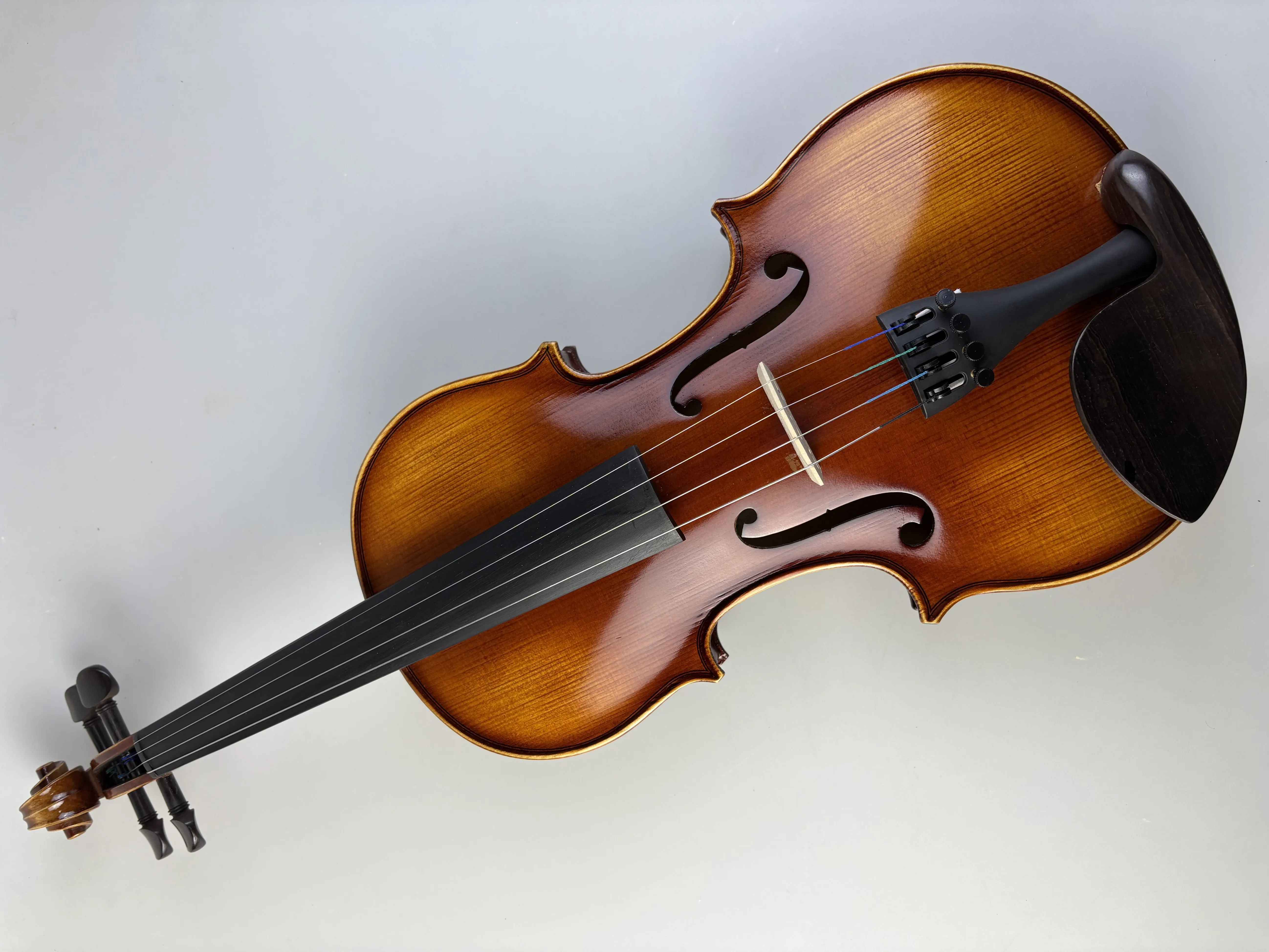 4/4 violin with square box, ebony bow, rosin, plastic shoulder rest, spare strings