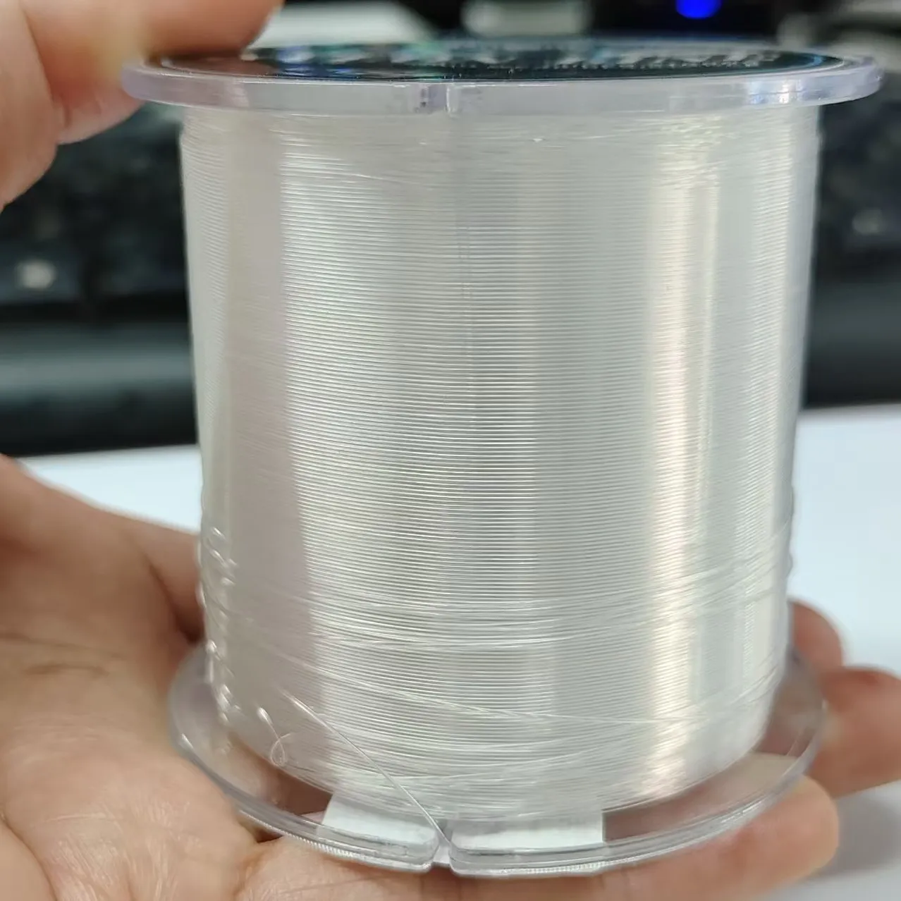 Línea de pesca de nailon transparente de 500M hecha de Material japonés monofilamento de línea fuerte para accesorios de pesca de perca y carpa