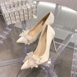 Scarpe con tacco alto da donna 2024 New Fashion Temperament Bow scarpe da sposa a punta con strass scarpe da sposa designer scarpe da festa