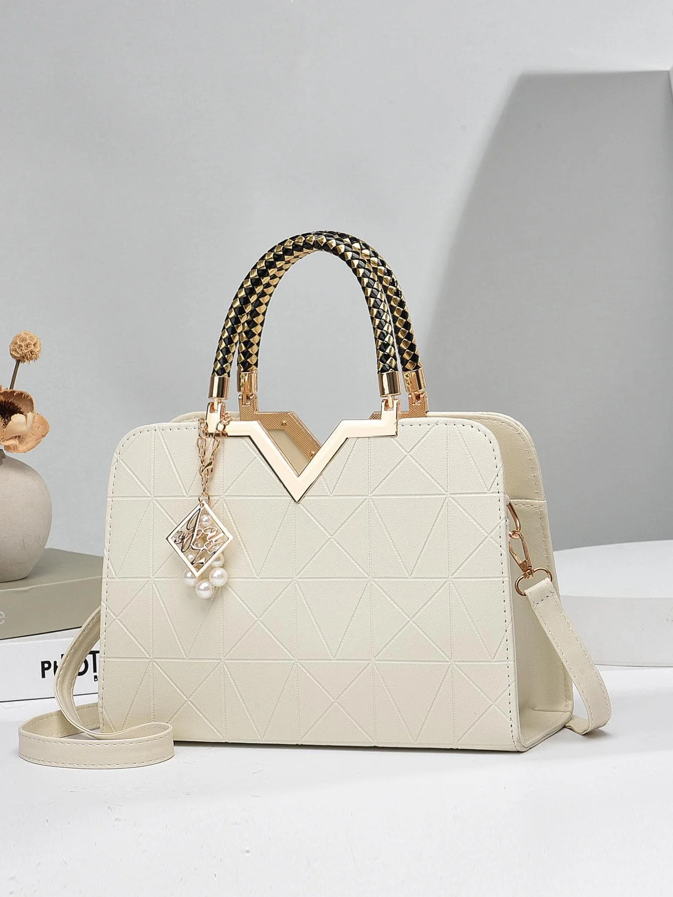 

Cream Geometric Quilted Top-Handle Bag with V-Frame & Braided Handle
