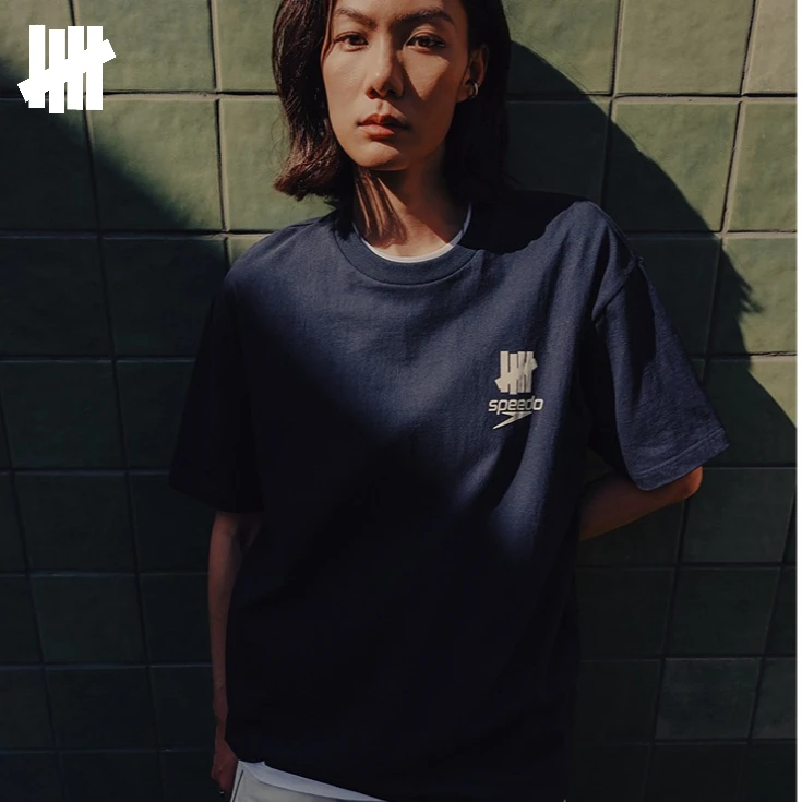 UNDEFEATED Unisex Co-branded Short Sleeve T-Shirt, Classic Chest Logo Print Loose Fit Cotton Tee for Street Daily Wear