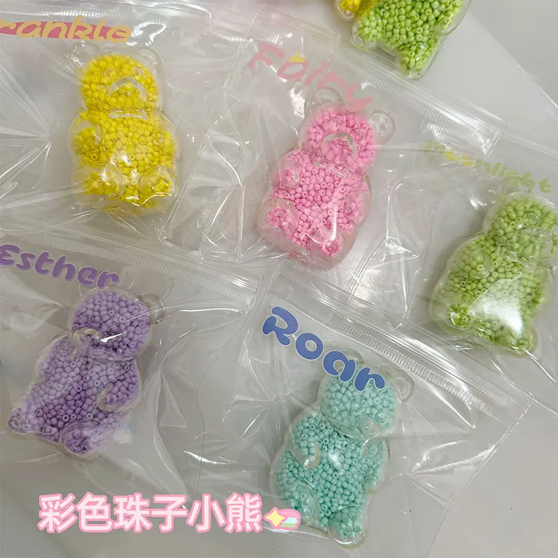 

Macaron bear pinching music noisy ball decompression toy moldable pearl candy bear handmade ball disc string pinching