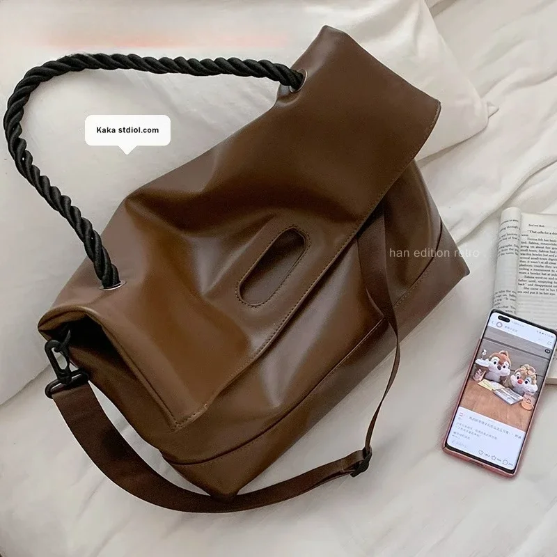 Huge capacity women's new trend South Korea Tote bag Single shoulder crossbody commuter bag soft leather portable