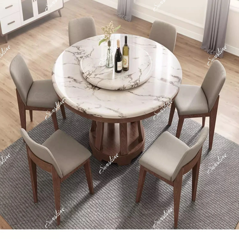 

Nordic marble round dining table and chairs modern simple solid wood fire stone dining table