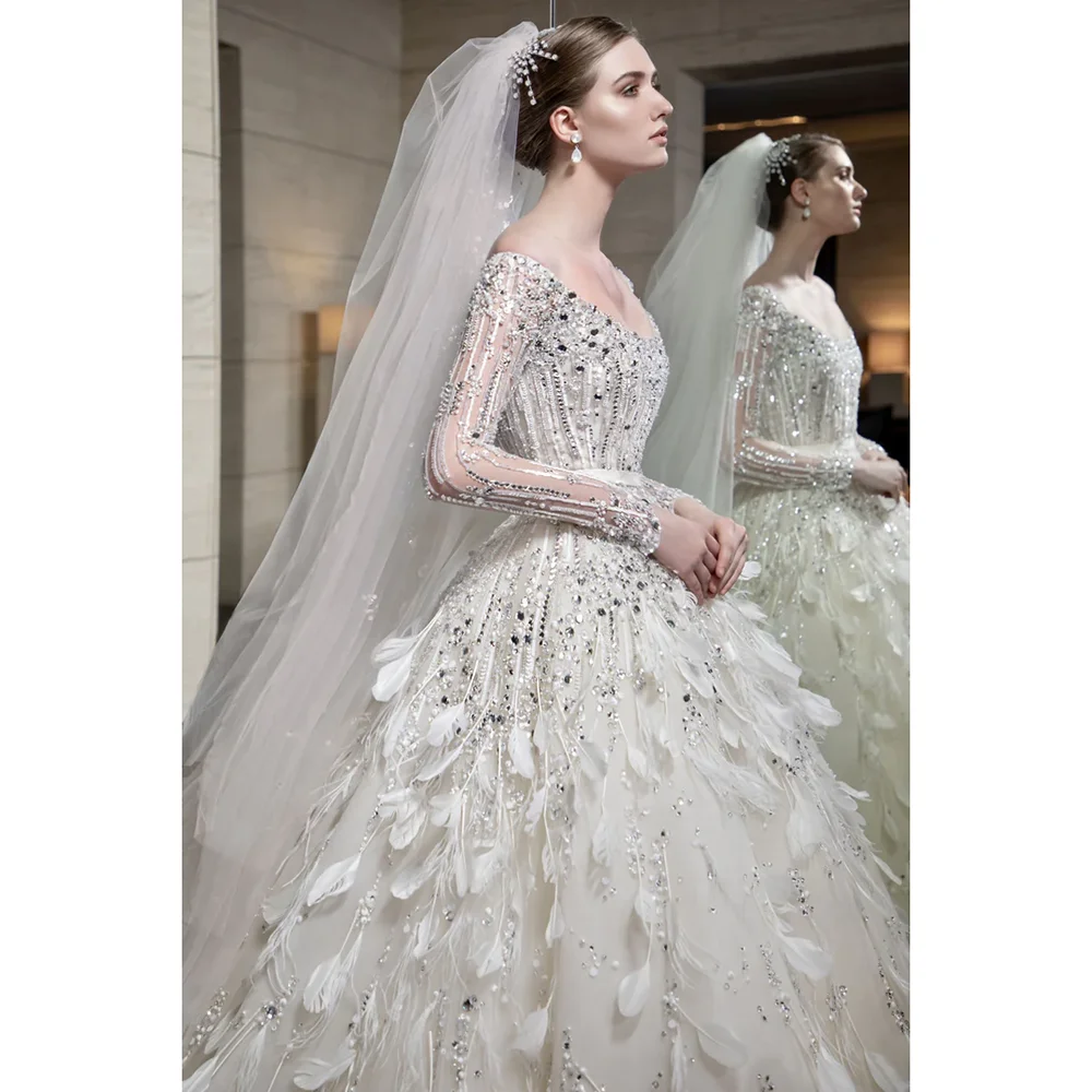 Luxury White Wedding Dress Elegant Boat Neck Beads Sequined A-Line Gowns Fashion Court Train Pearls Feathers Bride Dresses