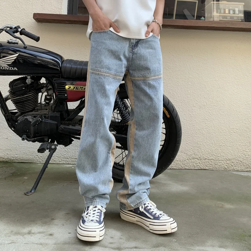 ออกแบบเสื้อผ้าผู้ชายอเมริกันตรงกางเกงยีนส์ผู้ชายหลวมบุคลิกภาพ Splicing Retro แฟชั่น Casual ล้างกางเกงผู้ชาย