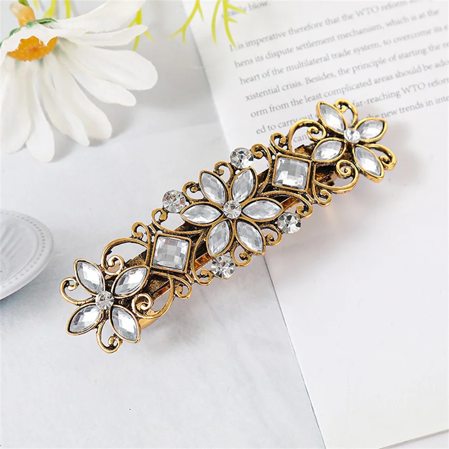 The new Korean version of the crystal flower spring hairpin elegant rhinestone wild ponytail hairpin women\'s hair accessories