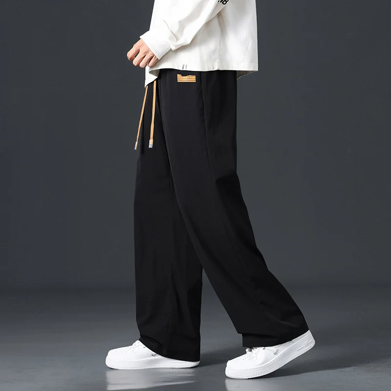 

Корейские мужские повседневные брюки, летние брюки из тонкого ледяного шелка, прямые брюки без металла, средней высокой талии, дышащие, удобные, прямые брюки...