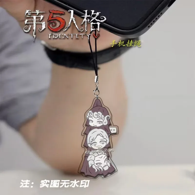 سلسلة هواتف محمولة محيطية "Identity V" كرتونية "Tomb Keeper، Broken Wheel" هي نفس الطراز لحبل الهاتف المحمول والقلادة