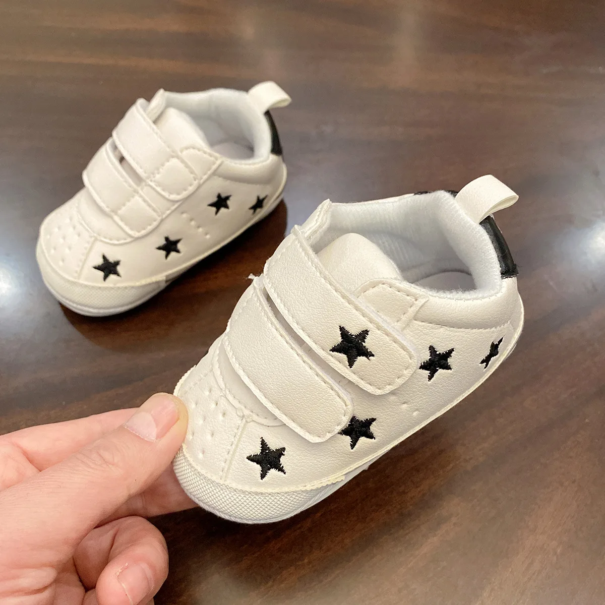 Primavera y otoño nuevo 0-1 año niño y niña bebé suela suave superficie suave zapatos blancos zapatos para niños recién nacidos