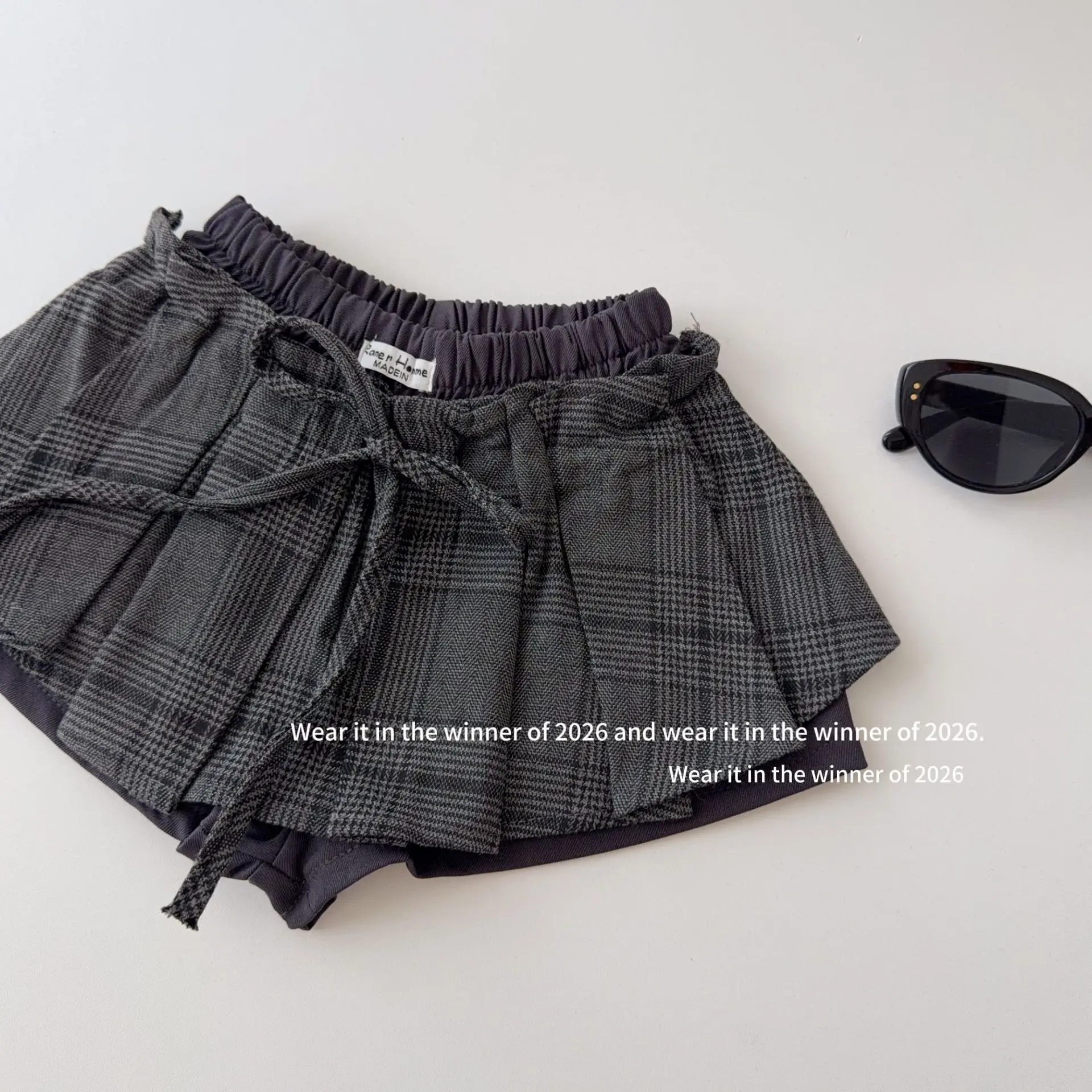 Girls' Autumn Lace Up Plaid Half Skirt Low Waist Spicy Girl Temperament Design Sense Short Skirt 2026 New