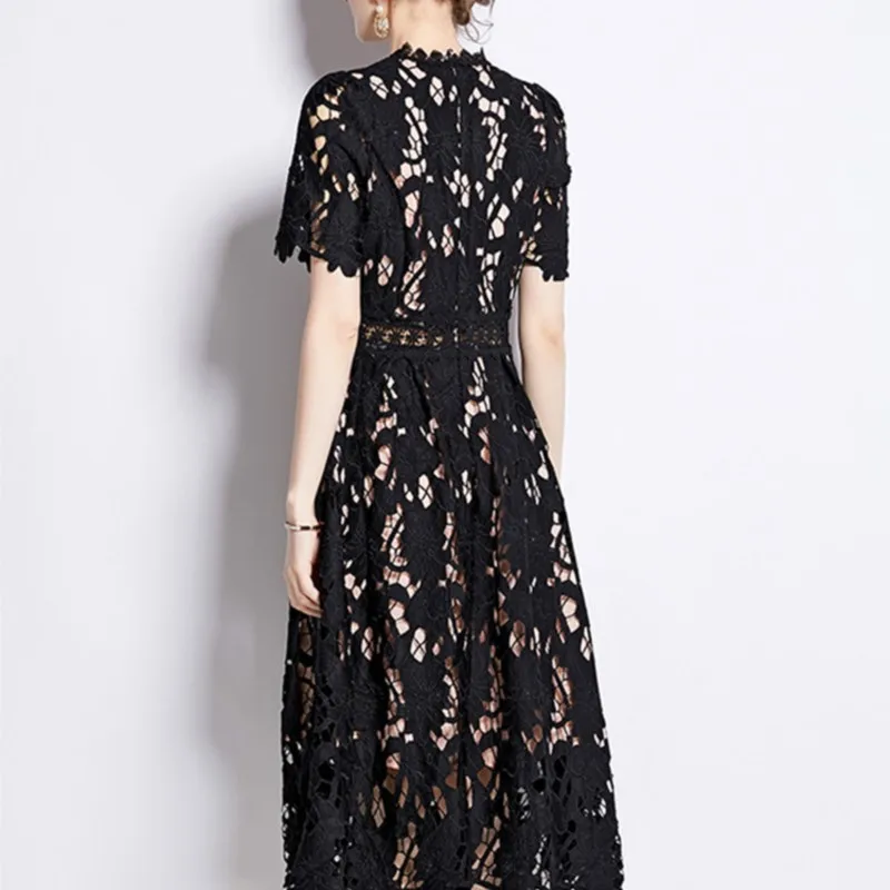 2025 Nieuwe hoogwaardige borduurkant holle jurken Damesjurken met O-hals en korte mouwen