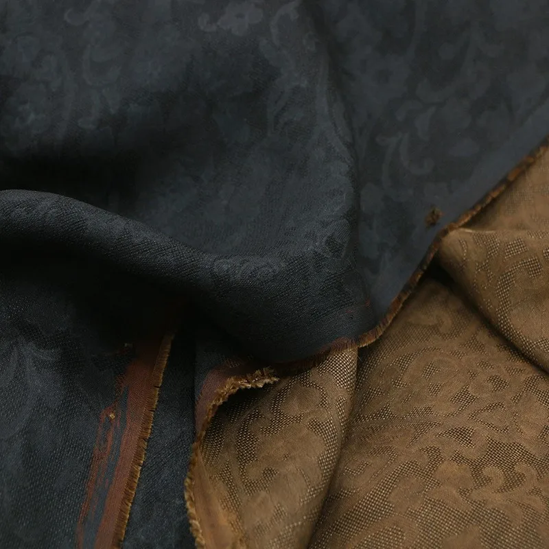 

Silk perforated jacquard intangible cultural heritage Xiangyunsha fabric natural plant tuber and river mud dyed