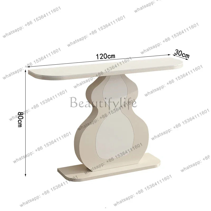 modern simple rock slab entrance table is opposite the door cabinet corridor against the wall end view table