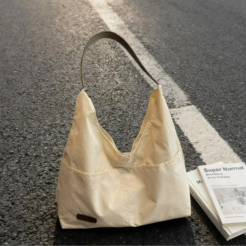 

New Simple Tote Bag for Women Large Capacity Canvas Shoulder Bag Casual Student Comfortable and Versatile Texture Commuting Bag