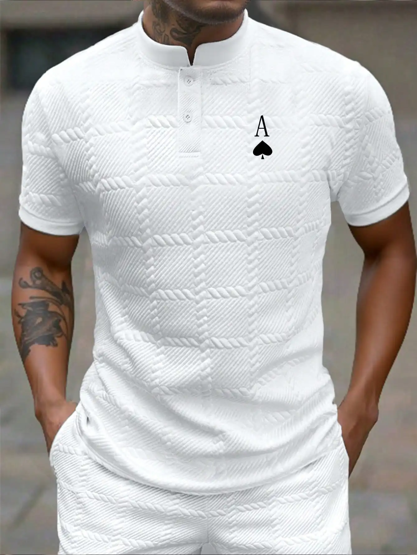 

Men's White Textured Polo Shirt with Minimalist Graphic Design, Casual Business Style