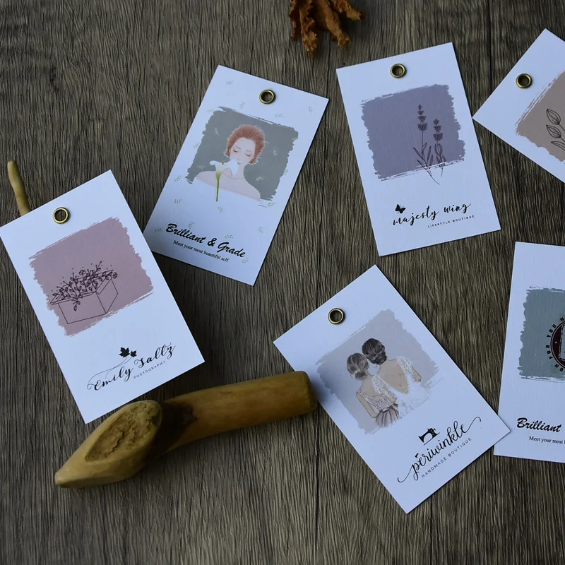

Customizing Your Logo Company Name Design on 300gsm Special Paper Texture Tag Price Label with Metal Eyelet Hole