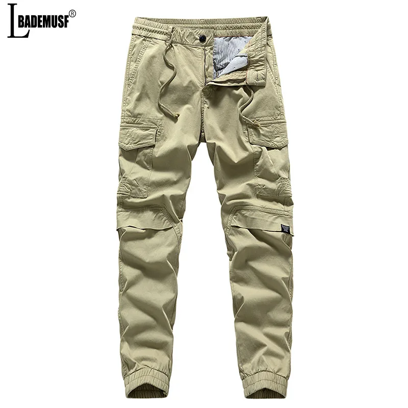 New Solid Color Loose Fitting Men Cargo Pants 2024 Street Fashion Multiple Pockets Jogging Motion Drawstring Elastic Force Pants