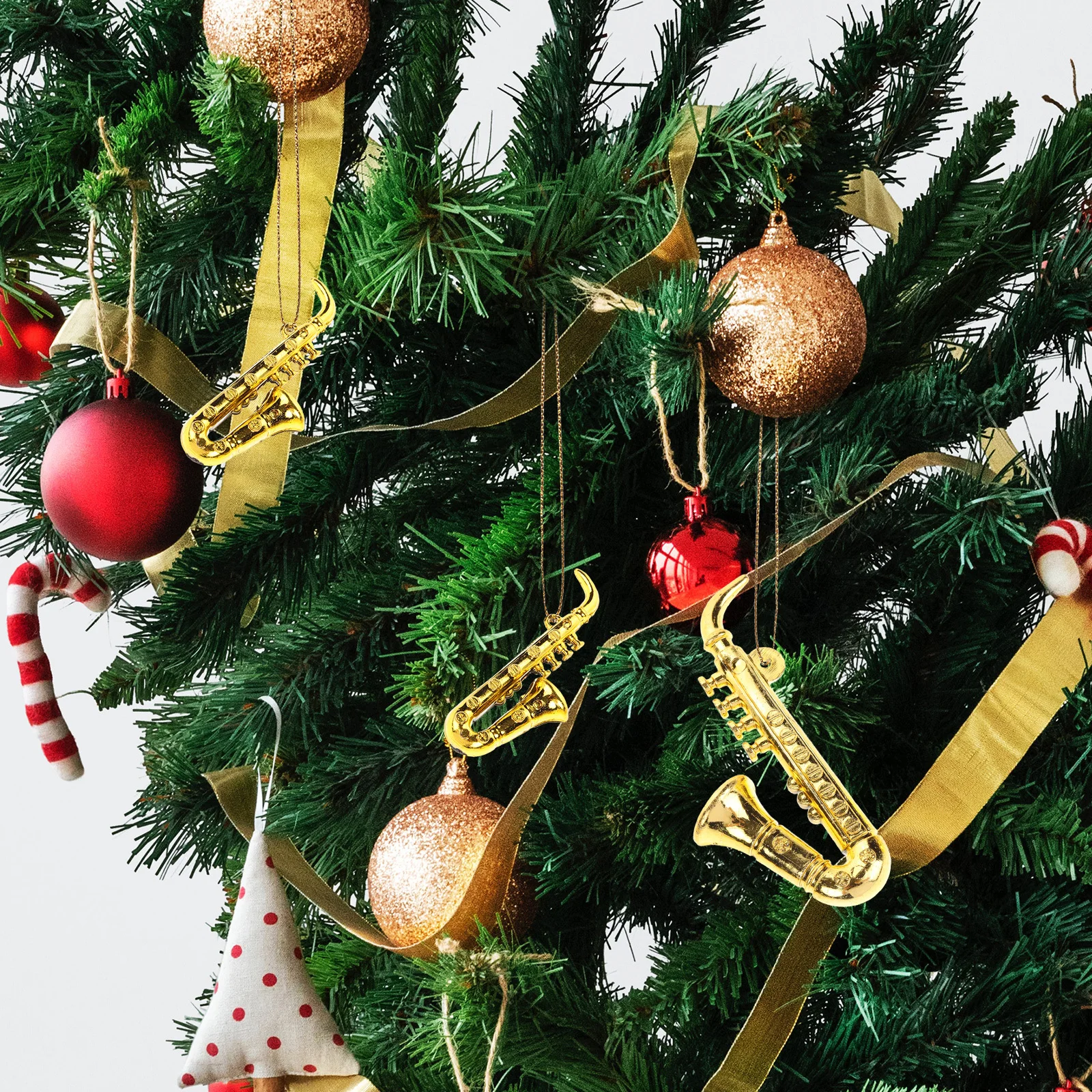 Adornos de saxofón en miniatura de 20 piezas, decoración colgante de árbol de Navidad de plástico, Mini instrumento Musical para fiesta de Navidad, escritorio en casa