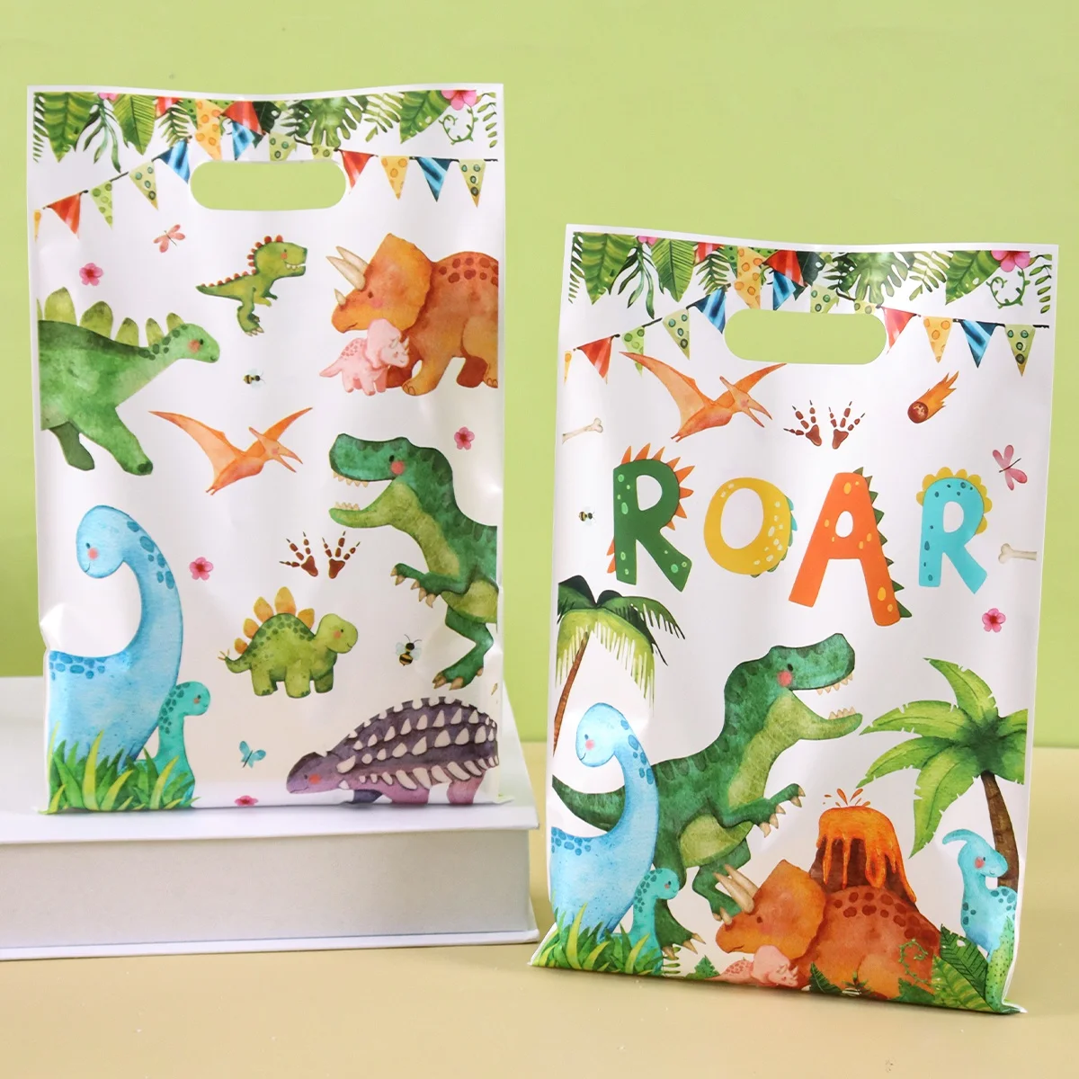 10/20/50 sacs cadeaux en plastique à motif dinosaure de dessin animé, sacs à friandises pour fête d'anniversaire sur le thème de la jungle et des dinosaures