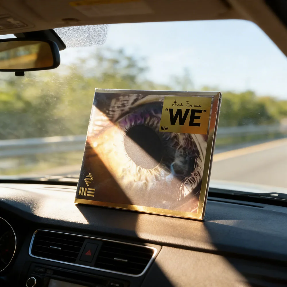 

CD This Is WE, The Sixth Studio Album By Canadian Indie Rock Band Arcade Fire.core "gaze, Connection, and Human Community."