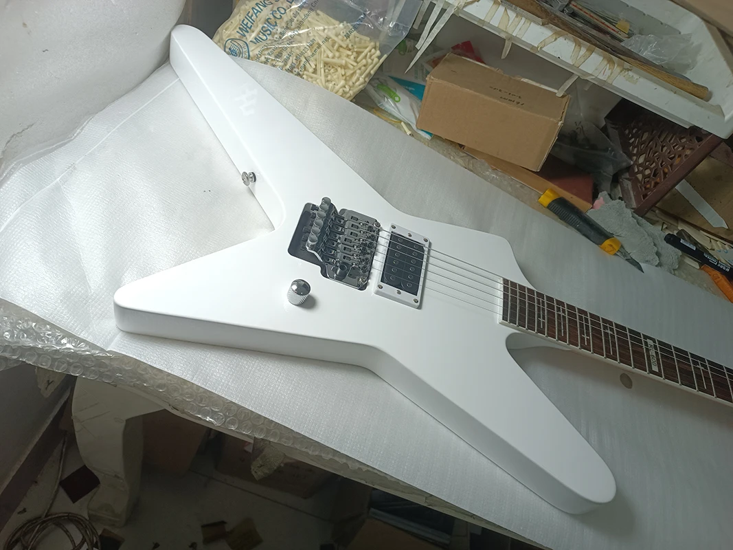 White electric guitar, lock string nut, Floyd Rose tremolo bridge guitar, one piece pickup