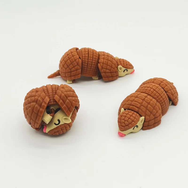 A cute pangolin statue ornament, suitable for use as a tabletop decoration or a car decoration item