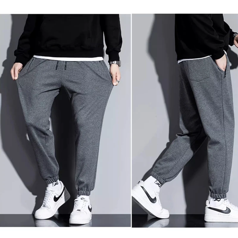 ฤดูใบไม้ผลิและฤดูหนาวกางเกงลําลองผู้ชายกางเกงกีฬาสีทึบหลวมพลัสไขมัน PLUS ขนาดแนวโน้มกางเกงขายาวทุกคู่