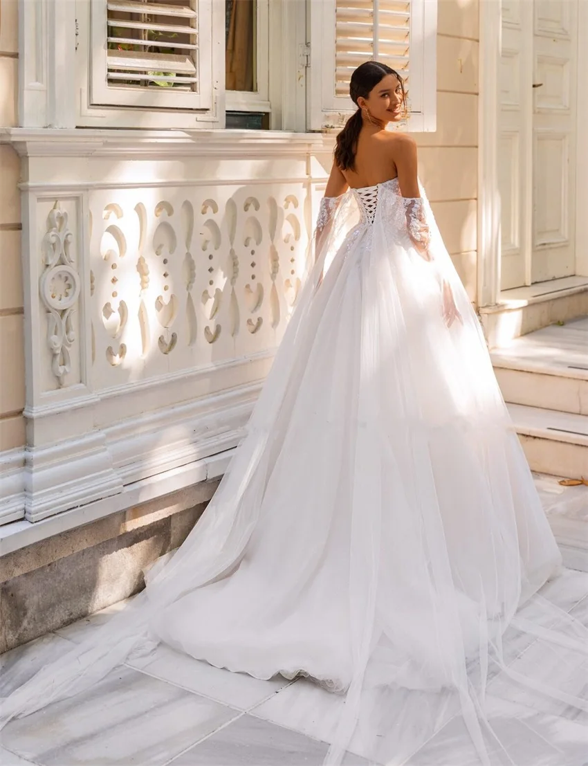 Boho trägerlose lange Tüllärmel A-Linie Brautkleider Sweep Zug Brautkleider Prinzessin Ehe Applikationen Vestidos De Novia