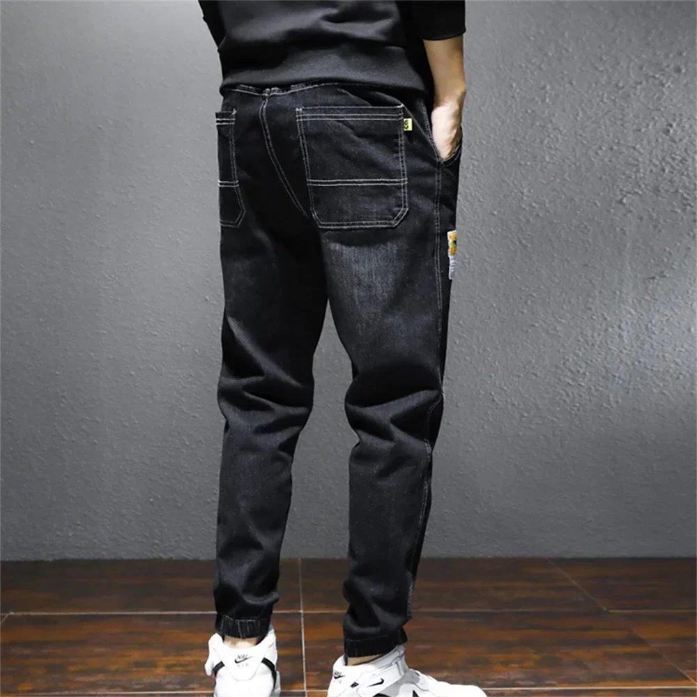 Japão coreano moda masculina perna larga jeans novo streetwear em linha reta baggy cintura elástica calças jeans masculino casual calças soltas