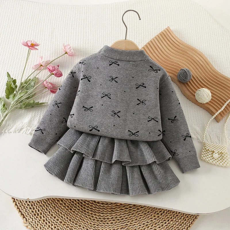 IYEAL Girls' Bow Sweater + Skirt 2025 Autumn New Korean Edition Children's Stylish Knitted Versatile Cake Skirt Two Piece Set
