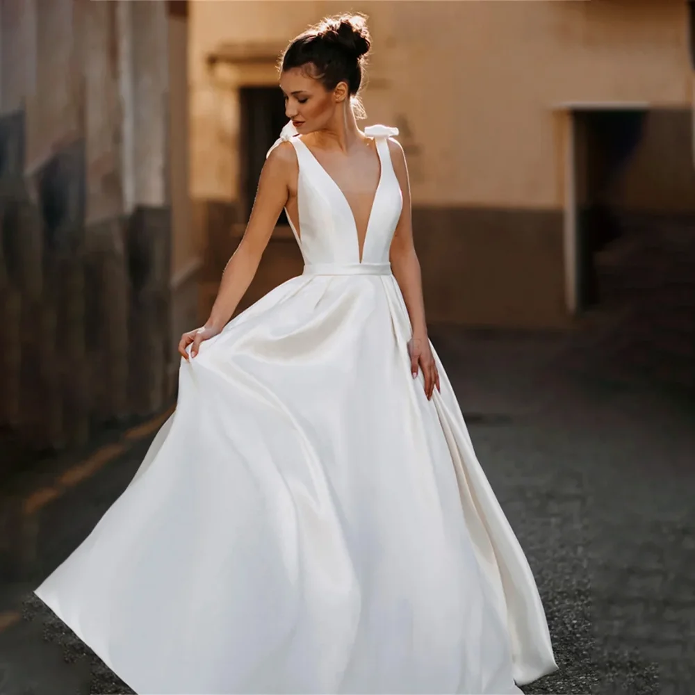 MANRUIXIN personnalisé une ligne robes De mariée Satin nœud papillon sans manches Robe De mariée col en v dos nu Robe De mariée robes De Noiva