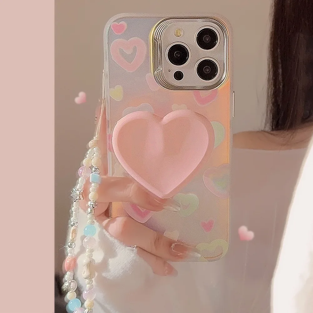 

The colorful heart-shaped phone case is equipped with a stand and a beautiful bracelet for IPhone 16 15 14 Pro Max 13