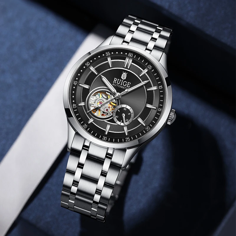 ساعة RUIGE ميكانيكية أوتوماتيكية بتصميم مجوف وحزام من الفولاذ المقاوم للصدأ، ساعة يد رجال الأعمال العصرية.