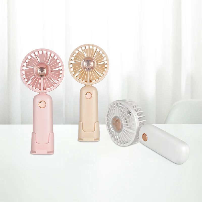 الجملة 1200 مللي أمبير مروحة صغيرة محمولة وحامل الهاتف الذكي قاعدة طاولة قائمة تعمل بالبطارية للاستخدام المنزلي للسيارة والمنزلية