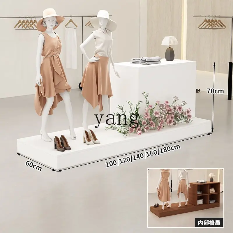 LH clothing store window display travertine nakajima flowing water platform shoe bag store display cabinet
