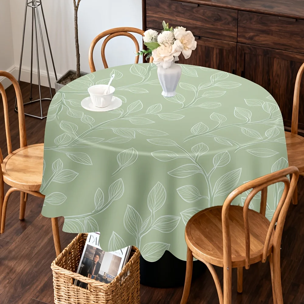 One soft green leaf-patterned round tablecloth, specially designed for a light and modern dining style.