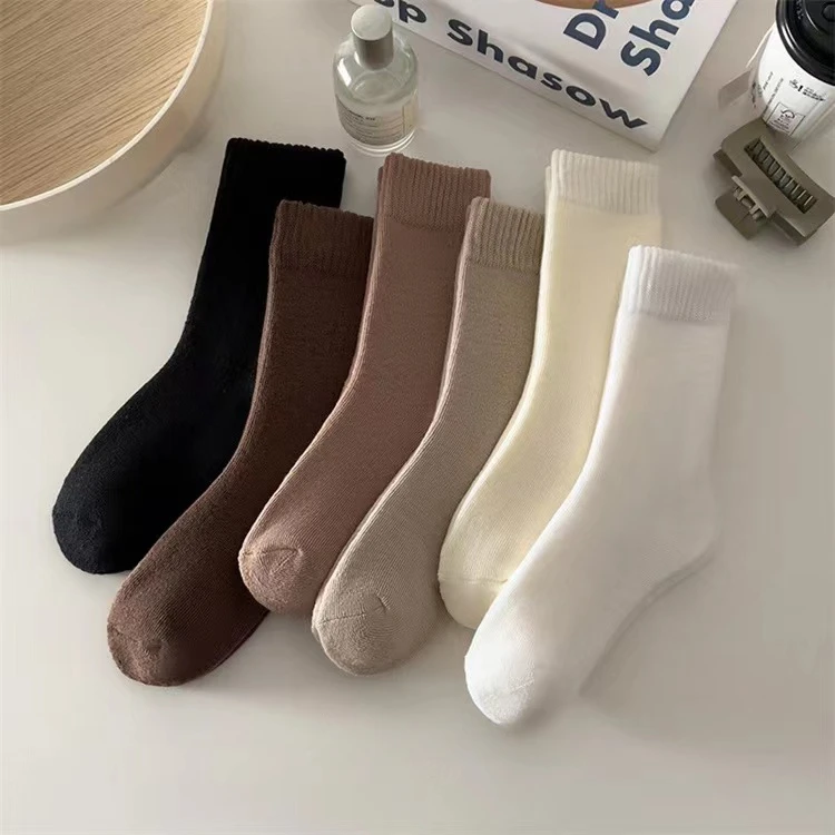 Socks women's autumn and winter thickened terry solid color velvet medium tube confinement socks sleep stacking socks