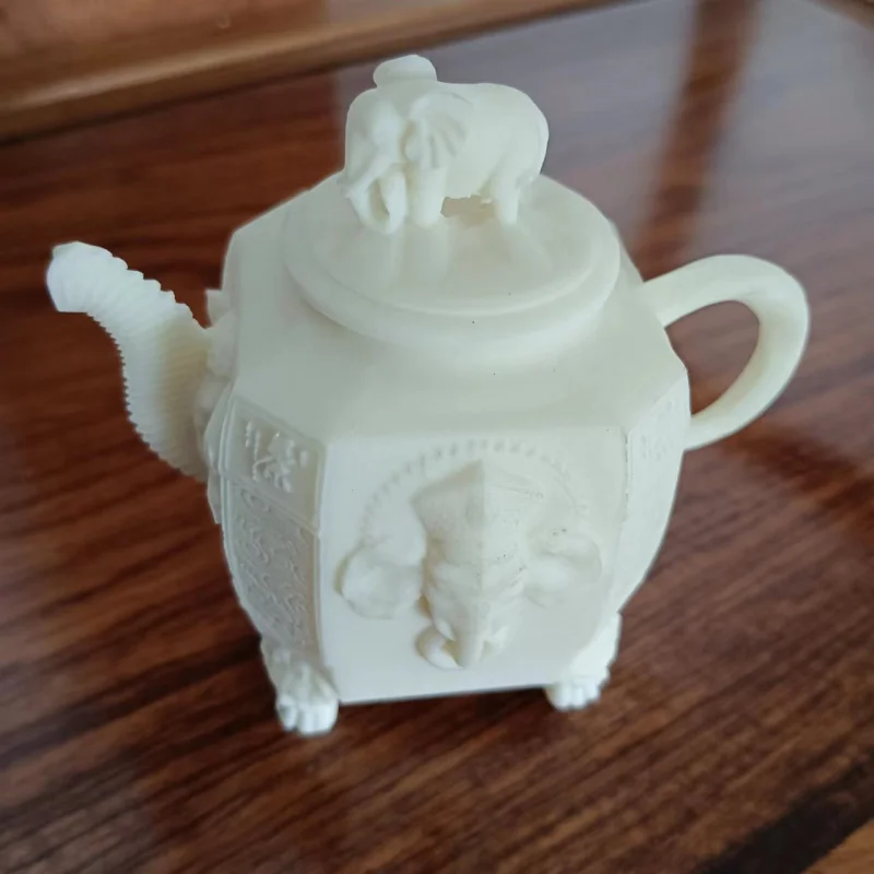 New Arrival Ivory Nut Elephant Pot Auspicious Eight Square Meters Hand Pieces Handle Pot Decoration Tea Ornaments Crafts Factory