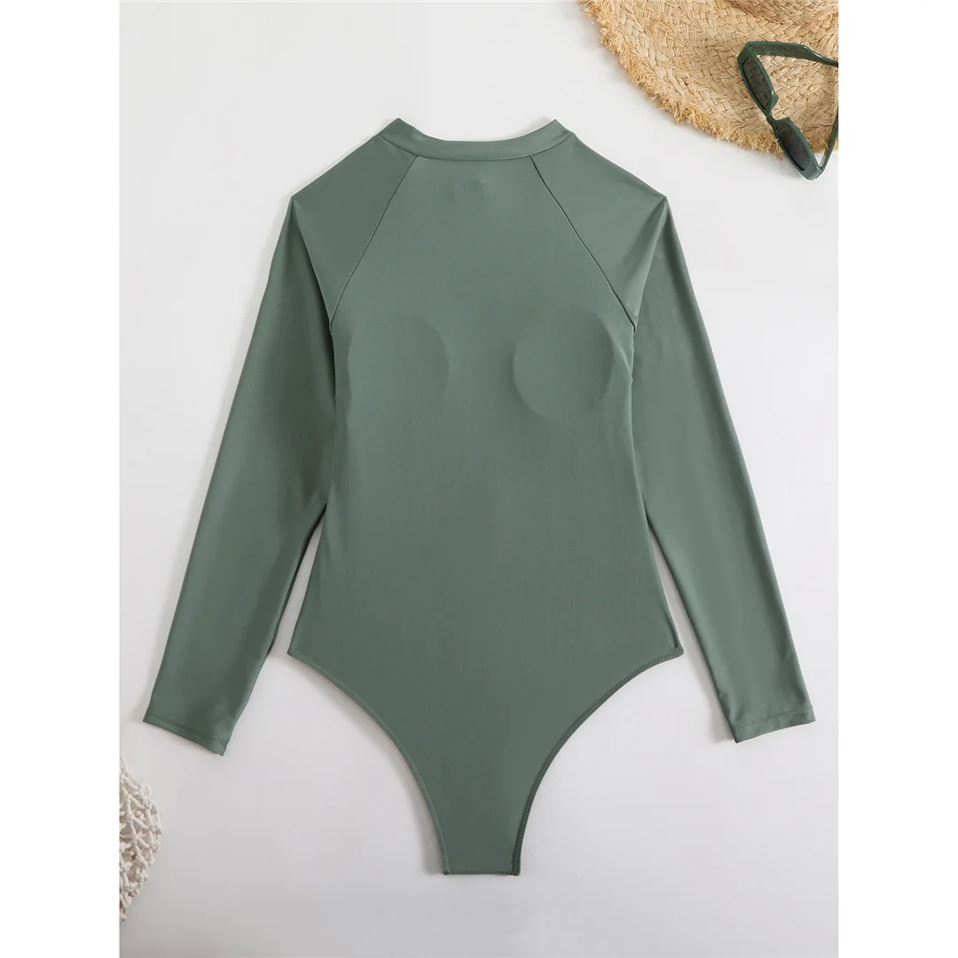 Sexy, hoch geschnittener, bedruckter, langärmliger, mit Reißverschluss versehener Surf-Rashguard, einteiliger Badeanzug, Damen-Badebekleidung, Damen-Badeanzug, Badeanzug, Modell V6285. – Detail 3