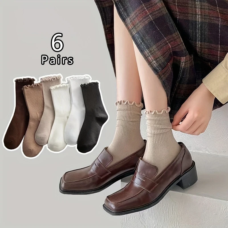 6 pairs of solid color soft and comfortable black fungus edge versatile mid tube socks