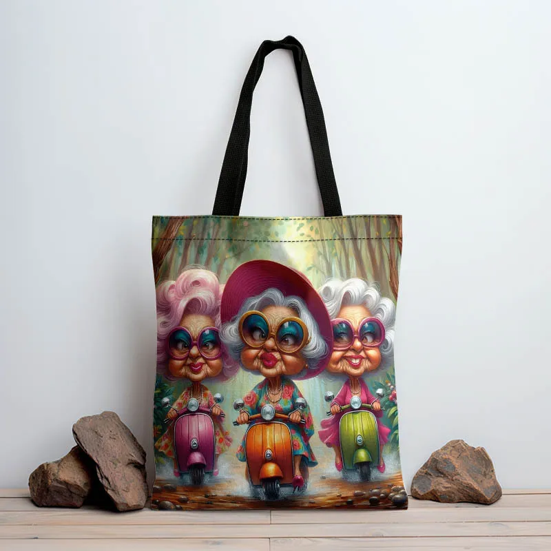 A Large Capacity Canvas Bag Featuring Three Elderly Ladies Riding Motorcycles for Everyday Use and Festive Women'S Shoulder Bag